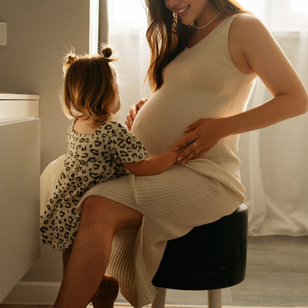 Beaumama robe longue grossesse fendu le côté femme enceinte blanche