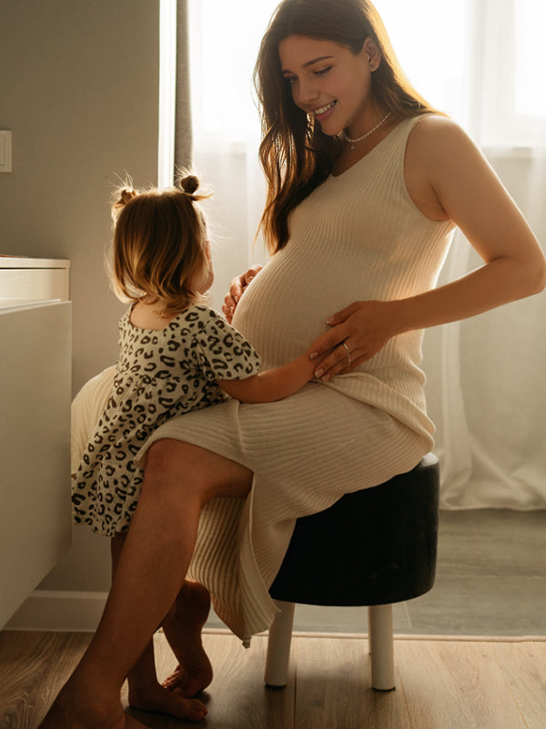 Beaumama robe longue grossesse fendu le côté femme enceinte blanche