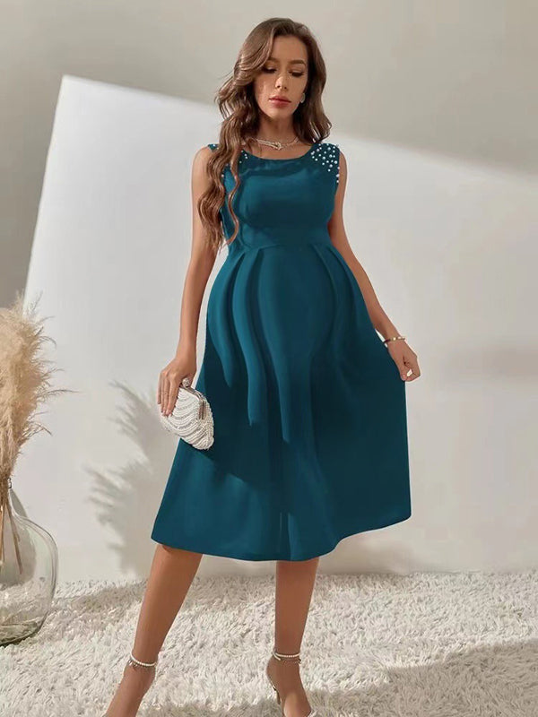 Robe mi-longue grossesse perle trapèze bleu marine