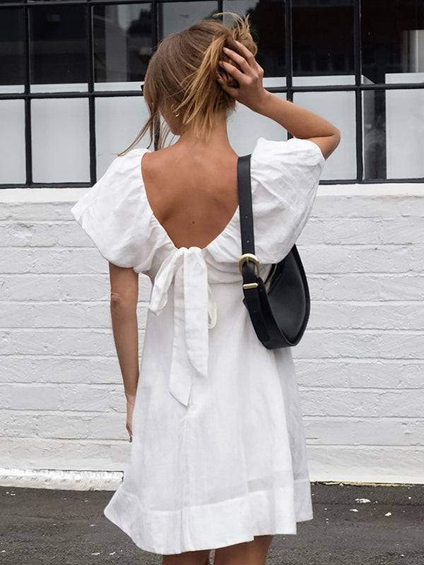 Beaumama robe mi-longue grossesse nœud papillon blanche