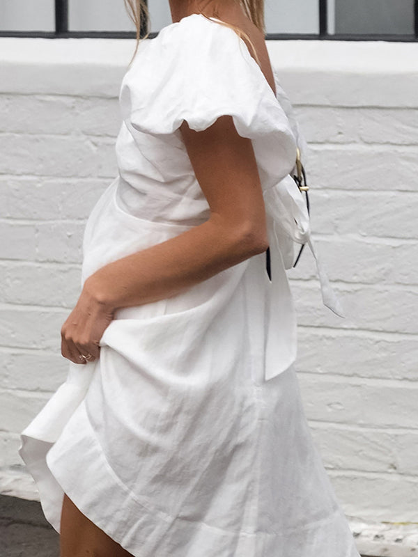 Beaumama robe mi-longue grossesse nœud papillon blanche