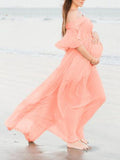 Beaumama robe longue grossesse à volantée fluide  shooting photo rose
